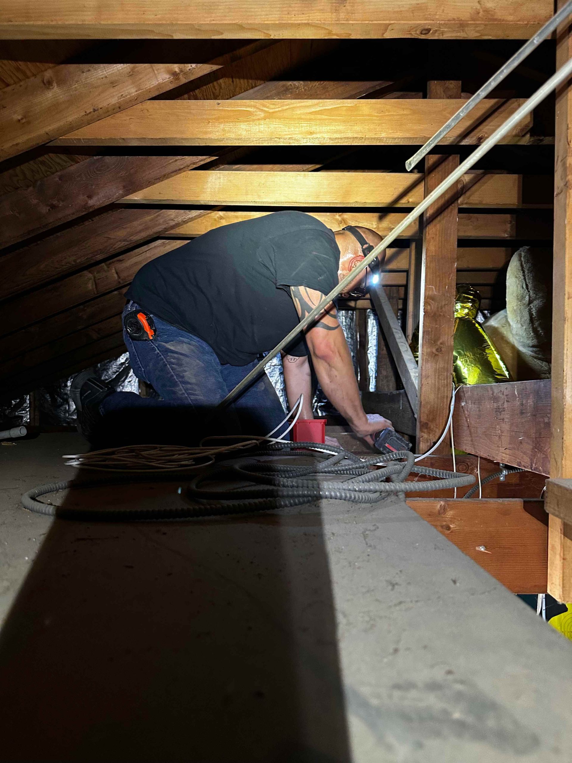 RedBird technician performing a home security camera installation in the Milwaukee, Wisconsin area