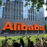 Alibaba’s shares jump after it lands a major customer...